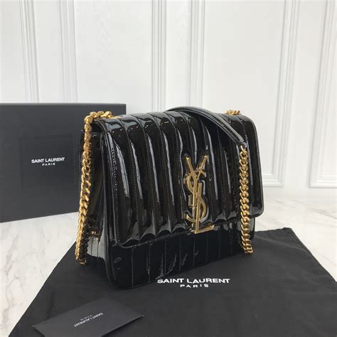 cream ysl purse|ysl saint laurent purse.